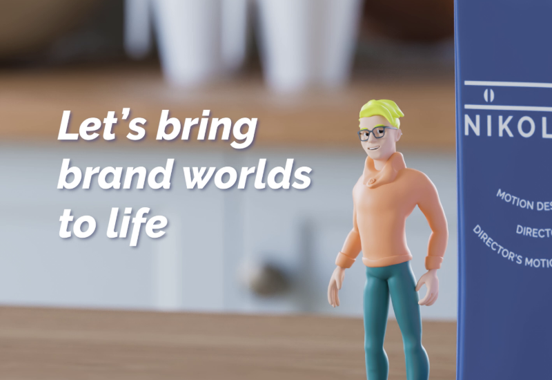 A miniature 3D caricature of NIKOLAUS stands beside a milk carton showing the NIKOLAUS logo. The tagline 'Let's bring brand worlds to life' beside him on a kitchen counter
